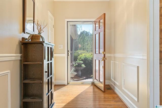 doorway with wood finished floors