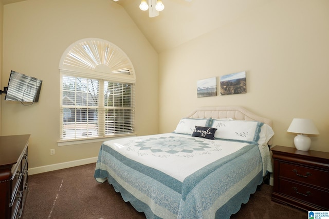 bedroom featuring dark colored carpet, vaulted ceiling, and baseboards