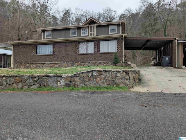 view of front of home featuring a carport