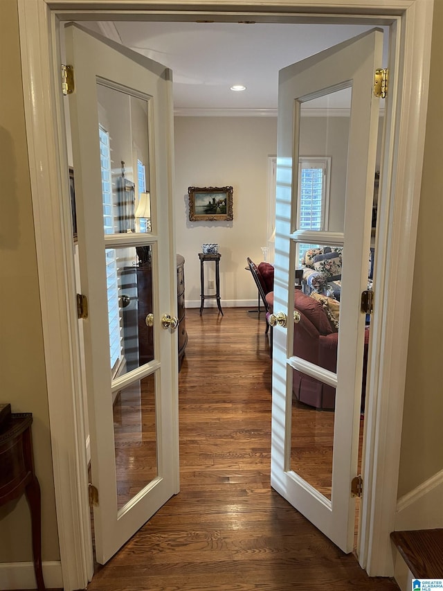 hall featuring dark wood-style floors, french doors, crown molding, recessed lighting, and baseboards