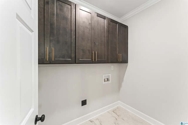 laundry area with washer hookup, marble finish floor, crown molding, cabinet space, and baseboards