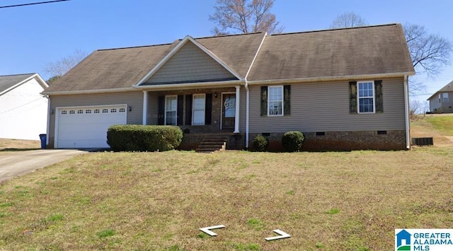 view of front of home with a garage and a front lawn