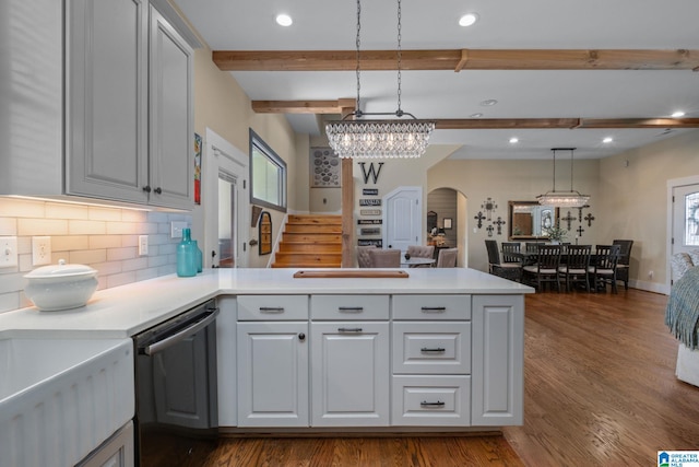 kitchen featuring arched walkways, dishwashing machine, a peninsula, and beam ceiling