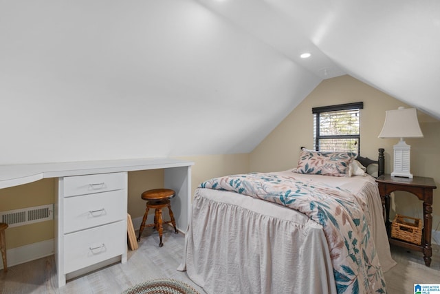 bedroom featuring light wood-style floors, lofted ceiling, baseboards, and recessed lighting