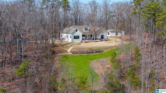 aerial view featuring a forest view