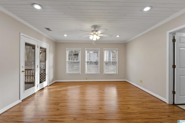 empty room with light wood-type flooring, ceiling fan, and ornamental molding