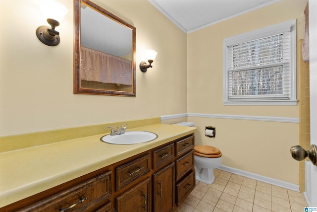 bathroom with vanity, crown molding, toilet, and tile patterned floors