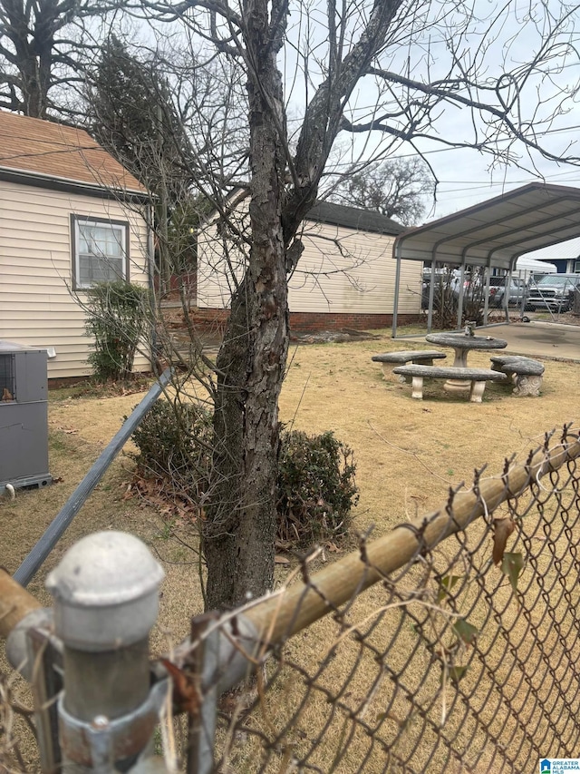 view of yard with a carport