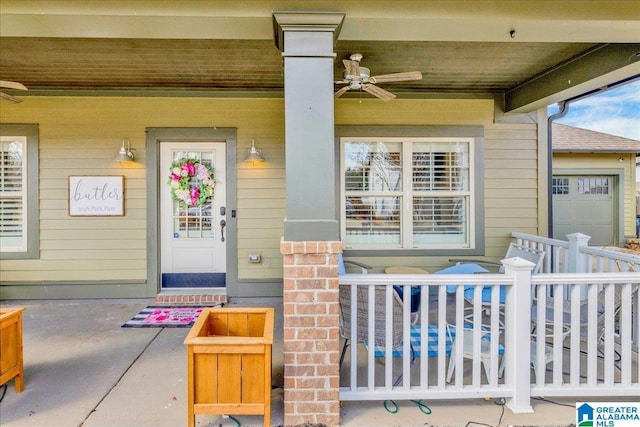 view of exterior entry featuring ceiling fan