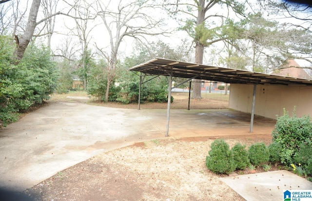 exterior space with a carport