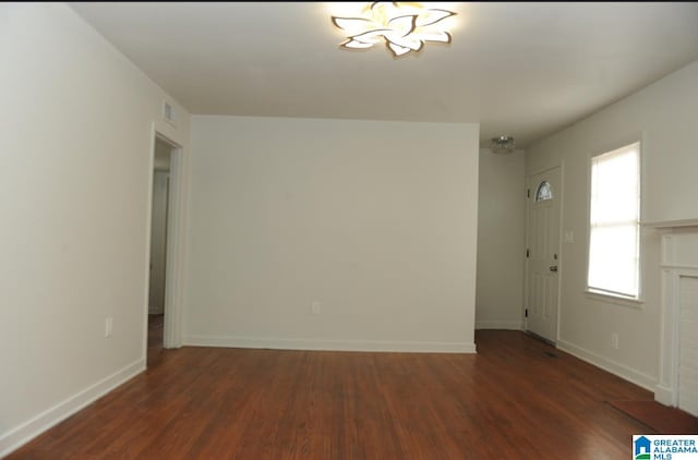 interior space with dark hardwood / wood-style flooring