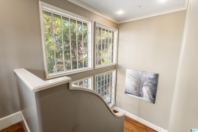 sitting room with recessed lighting, crown molding, baseboards, and wood finished floors