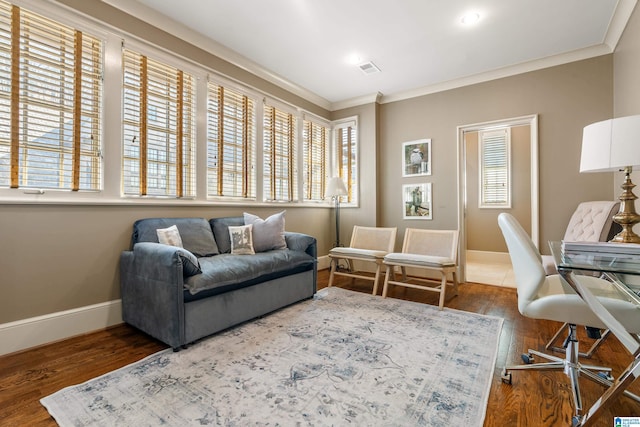 interior space featuring a healthy amount of sunlight, baseboards, dark wood-type flooring, and crown molding