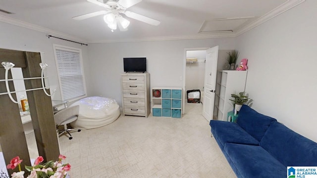 interior space with crown molding, visible vents, light colored carpet, and attic access