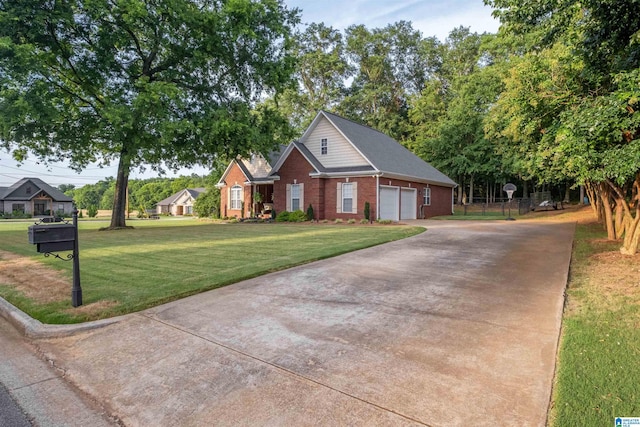 view of front of property with concrete driveway, a front lawn, a garage, and brick siding