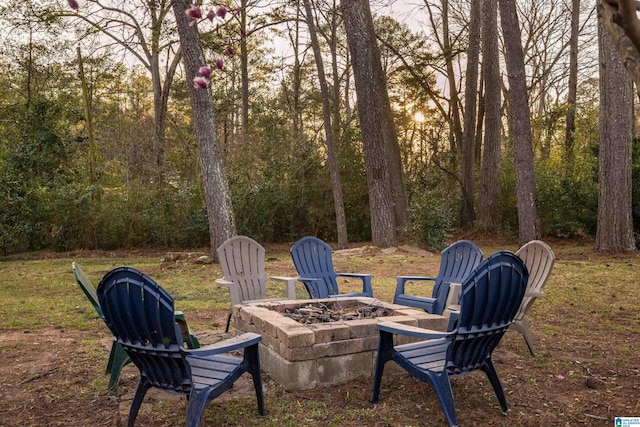 view of yard with an outdoor fire pit