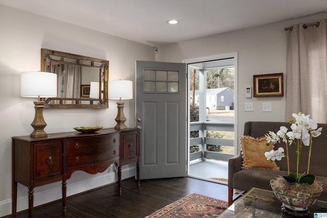 entrance foyer featuring dark wood-style floors and recessed lighting