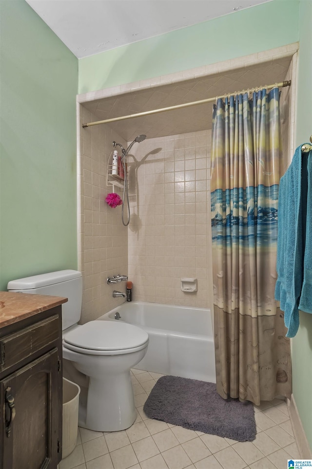 full bathroom with shower / tub combo, vanity, toilet, and tile patterned floors