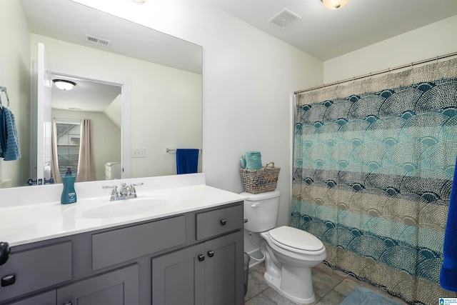 full bath with tile patterned flooring, visible vents, vanity, and toilet