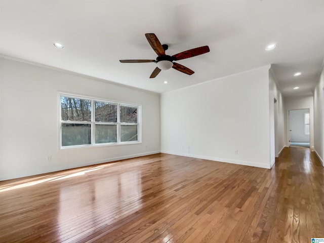 unfurnished room with light wood-type flooring, recessed lighting, baseboards, and ceiling fan