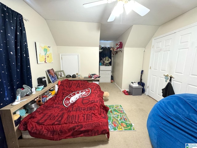 bedroom with carpet, vaulted ceiling, and ceiling fan