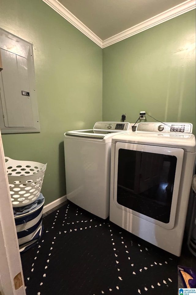 laundry area with laundry area, electric panel, ornamental molding, washer and dryer, and carpet floors