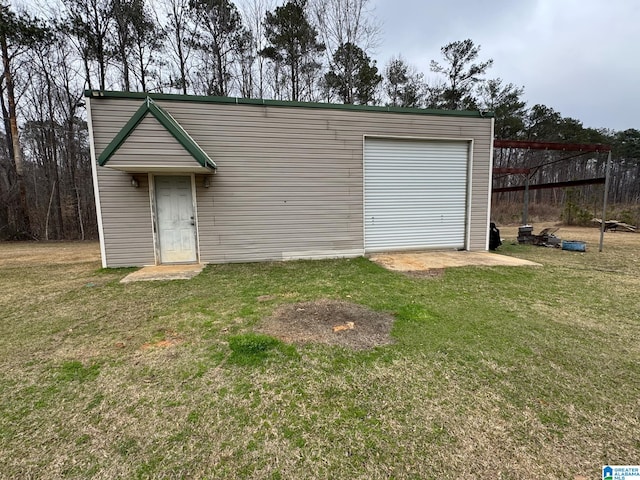 garage featuring driveway