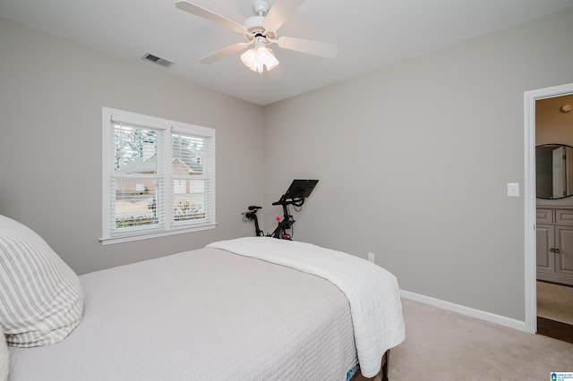 bedroom featuring light carpet, baseboards, visible vents, and ceiling fan