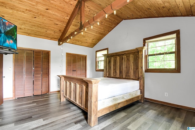 unfurnished bedroom with vaulted ceiling, multiple windows, wooden ceiling, and wood finished floors