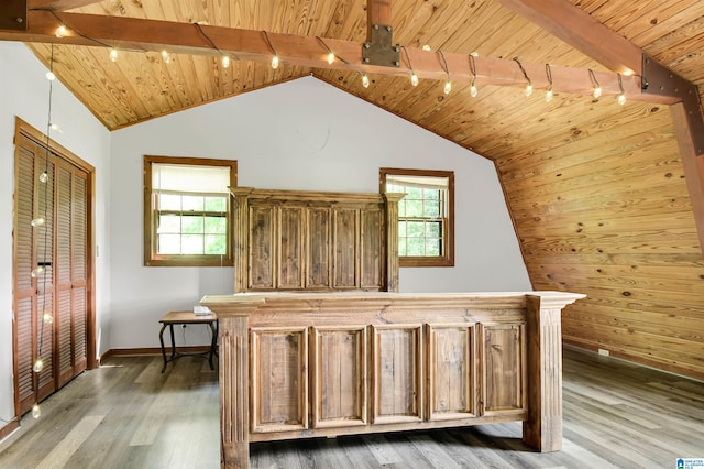 additional living space featuring wooden ceiling, lofted ceiling with beams, baseboards, and wood finished floors