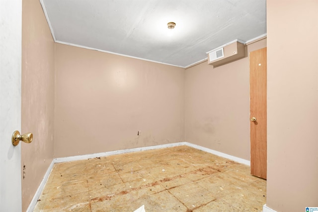 unfurnished room featuring baseboards