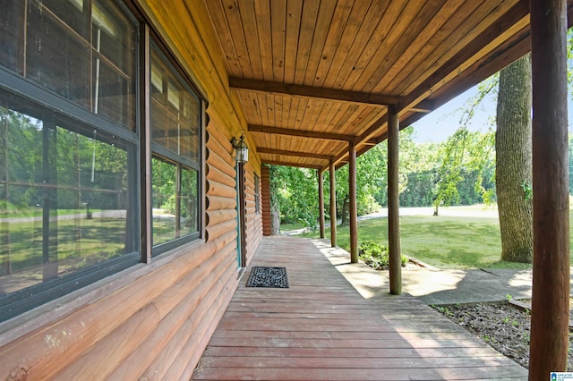 deck featuring a lawn