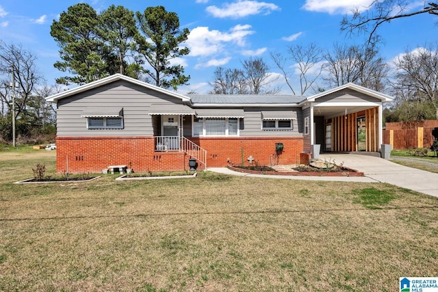 single story home with an attached carport, concrete driveway, and brick siding