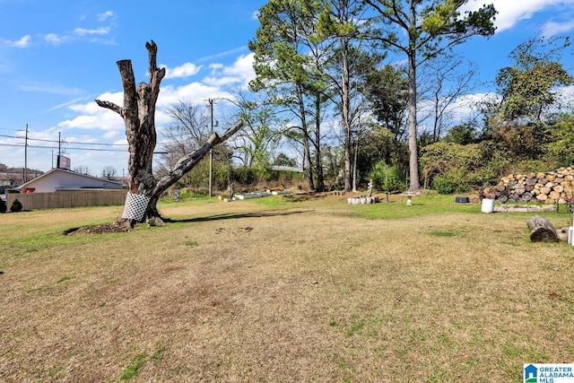 view of yard featuring fence