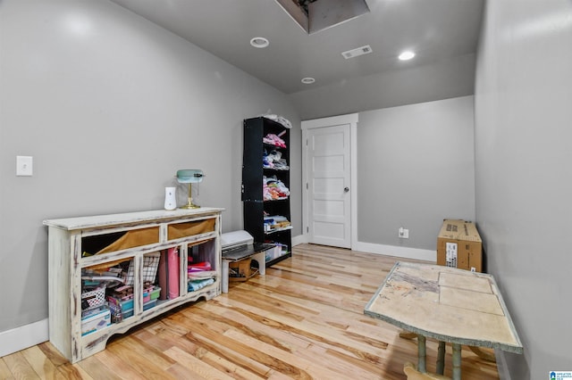 rec room featuring baseboards, visible vents, wood finished floors, and recessed lighting