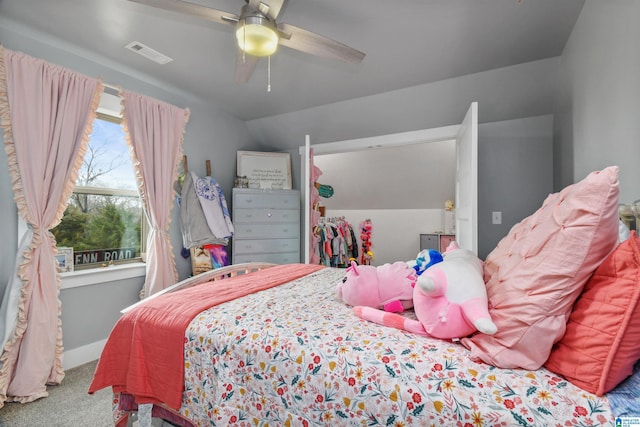 bedroom with ceiling fan, carpet, visible vents, and baseboards