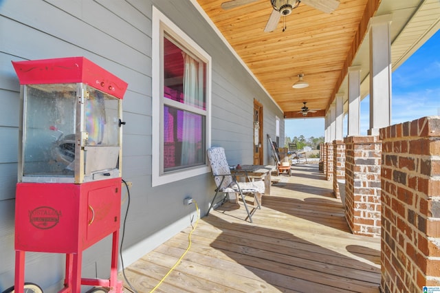 wooden deck with ceiling fan