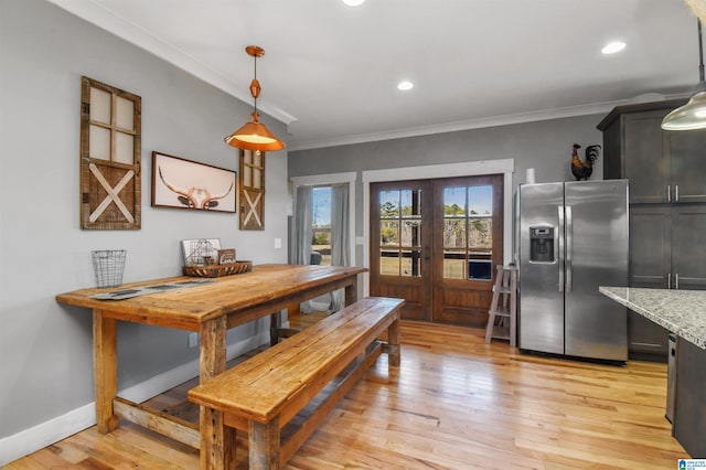 dining room with recessed lighting, baseboards, french doors, light wood-type flooring, and crown molding