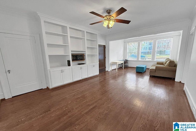 unfurnished living room featuring ceiling fan, ornamental molding, dark wood finished floors, and baseboards