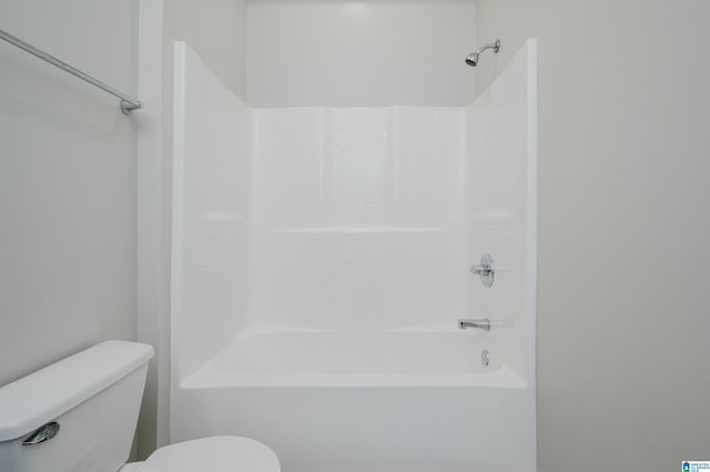 bathroom with toilet and shower / tub combination