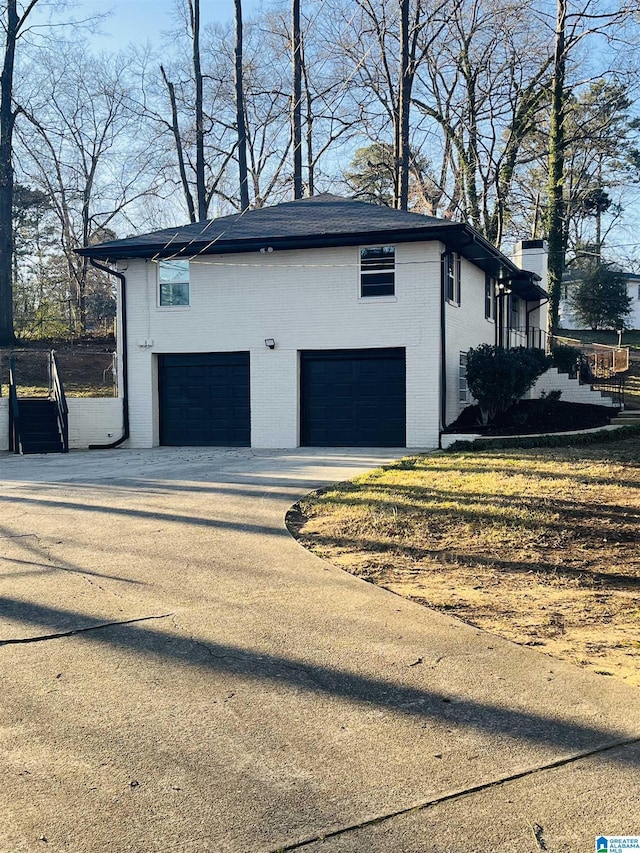 garage with driveway