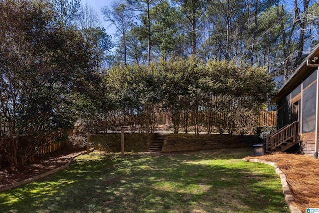 view of yard featuring a fenced backyard