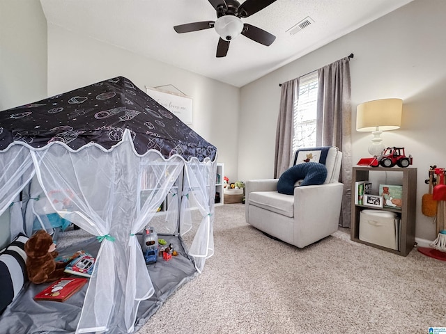 bedroom featuring carpet, visible vents, and ceiling fan