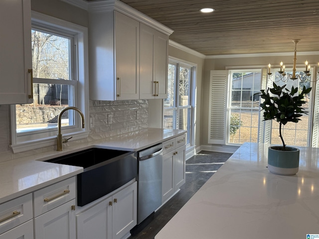 kitchen featuring white cabinetry, dishwasher, and light stone countertops