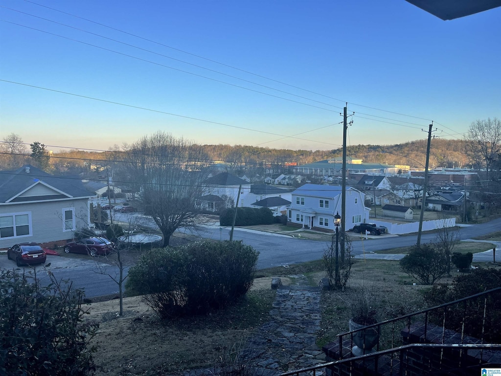 view of road with a residential view