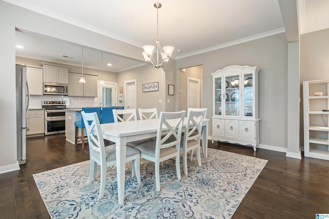 dining room with dark wood-style floors, ornamental molding, an inviting chandelier, and baseboards