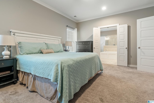 carpeted bedroom with visible vents, connected bathroom, baseboards, and crown molding