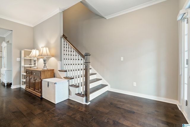 stairs with crown molding, baseboards, and hardwood / wood-style flooring