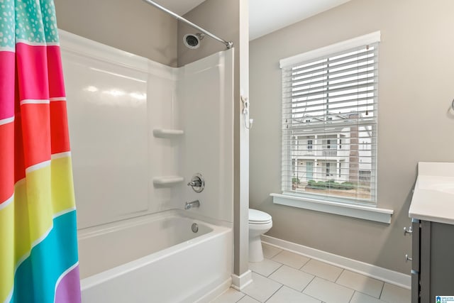 full bathroom featuring toilet, shower / tub combo, vanity, tile patterned flooring, and baseboards