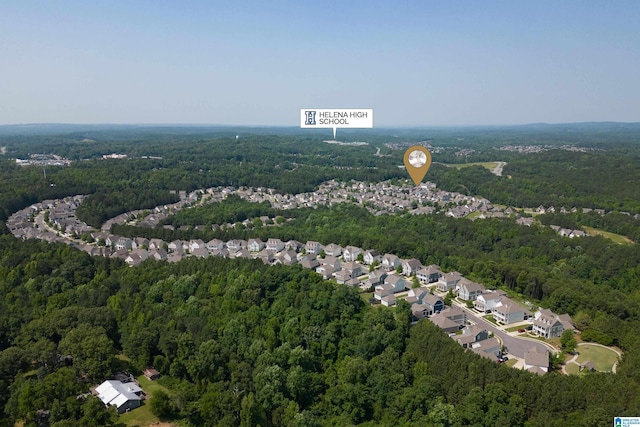 aerial view with a residential view and a view of trees